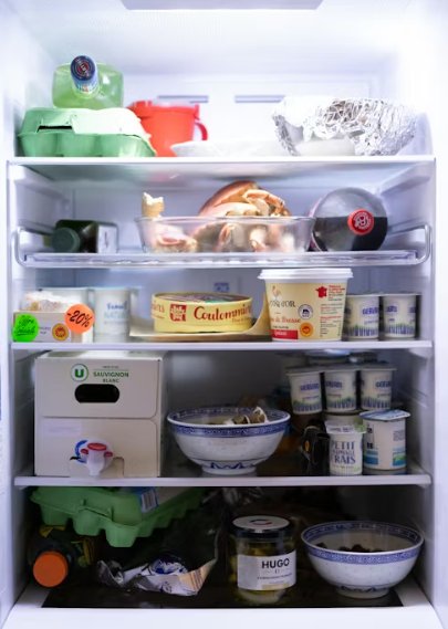 Open fridge full of ingredients
